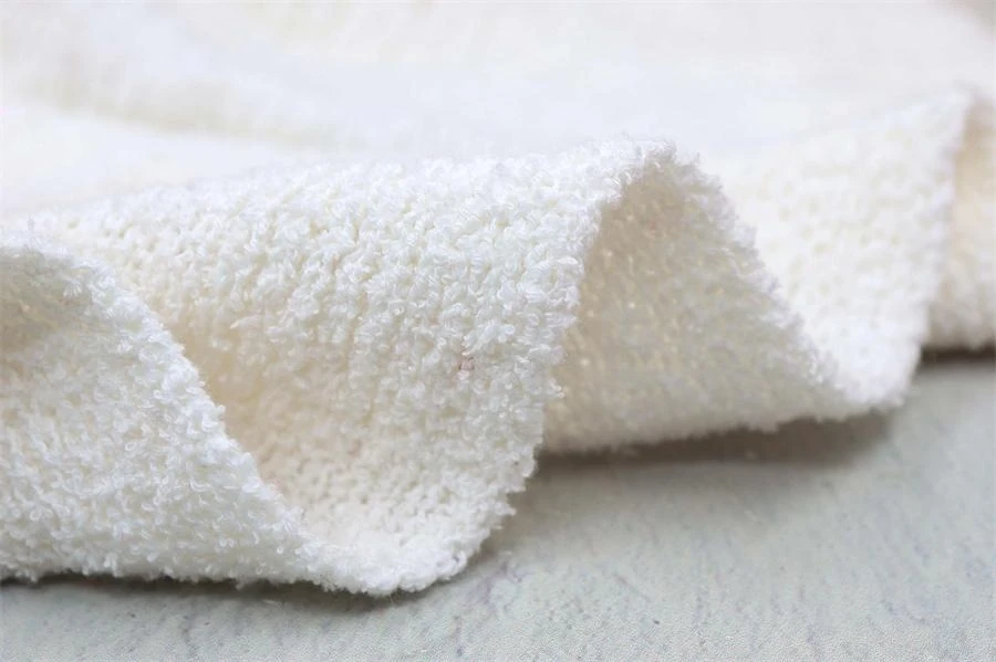 Boucle yarn, 7.5 Nm, 90% cotton / 10% nylon, 100 g / 750 m